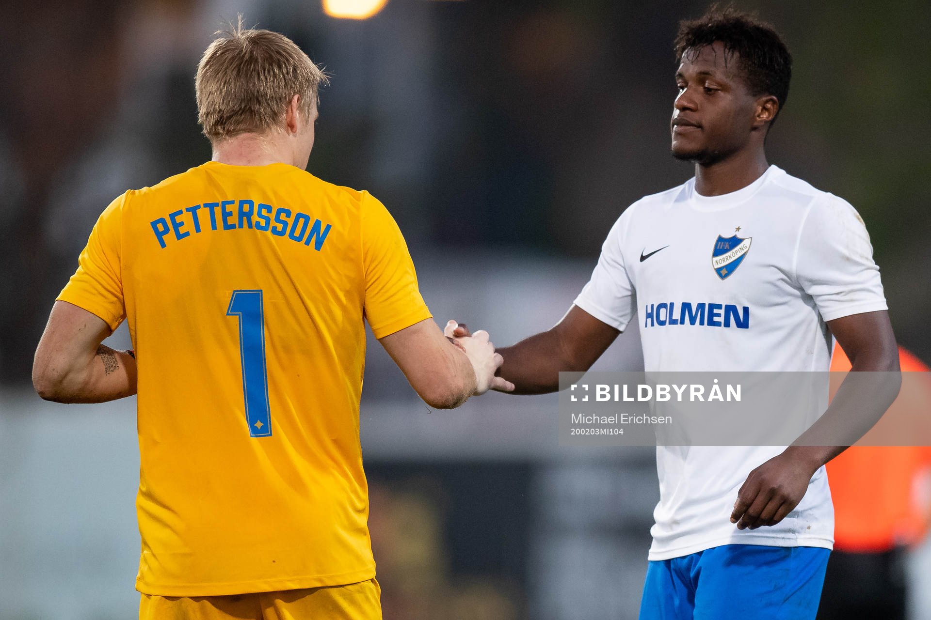 Goalkeeper Isak Pettersson of Norrköping and Manasse Kusu