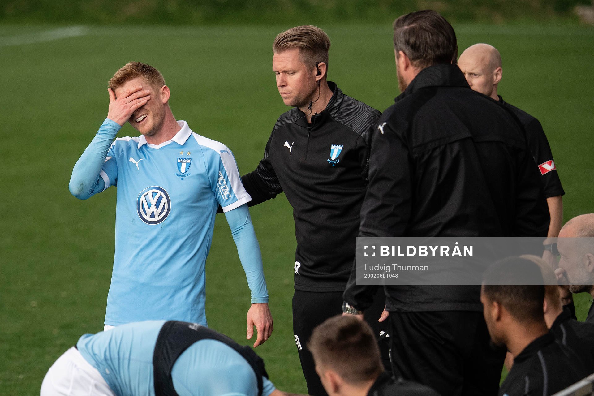 Anders Christiansen of Malmö FF leaves the pitch in pain