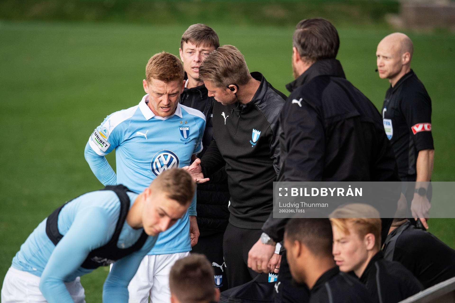 Anders Christiansen of Malmö FF leaves the pitch in pain