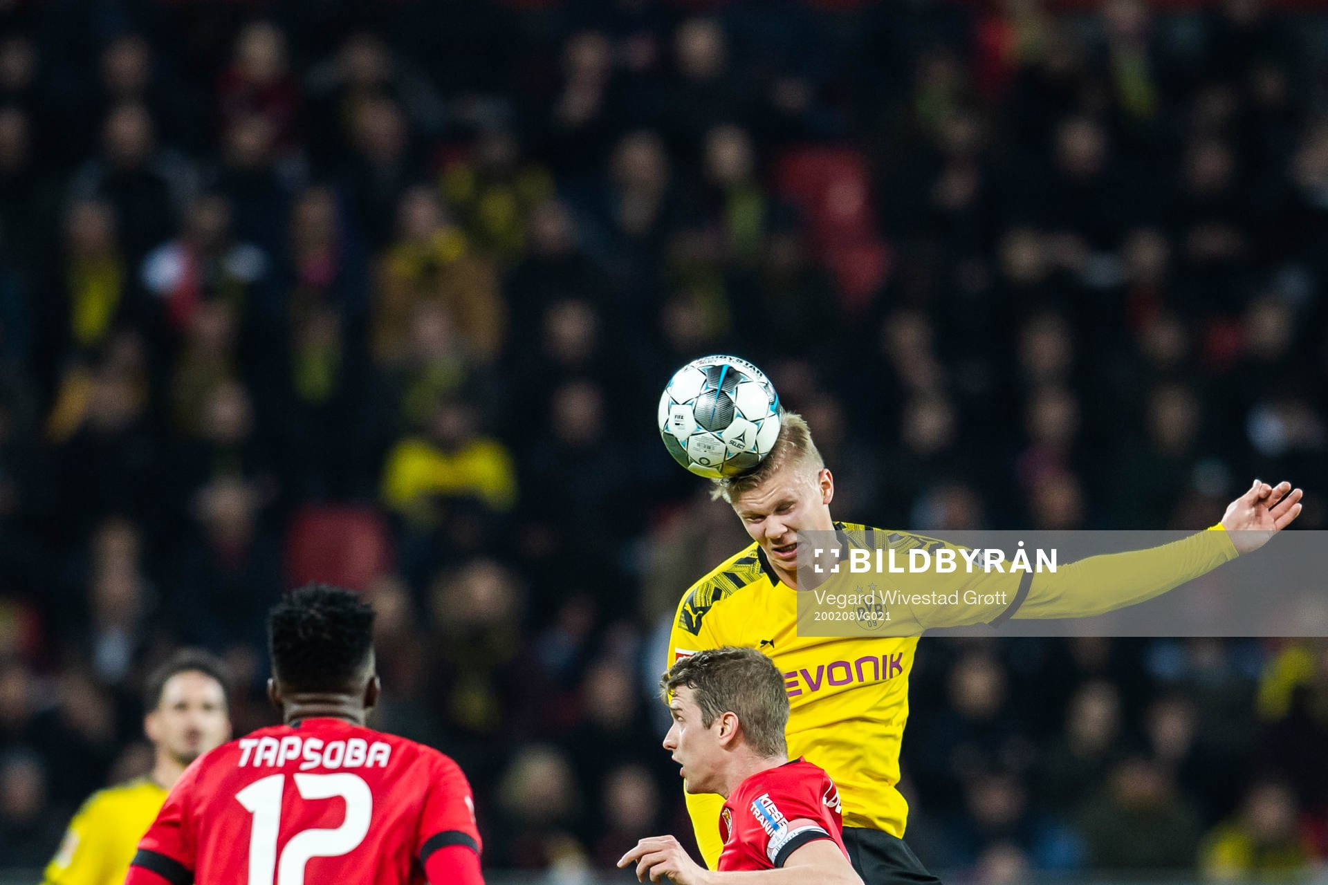 Erling Braut Haaland of Borussia Dortmund and Sven Bender