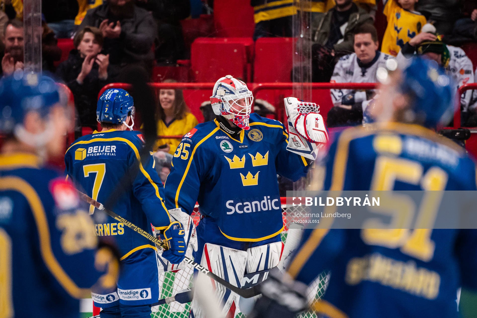 Goaltender Magnus Hellberg of Sweden celebrate