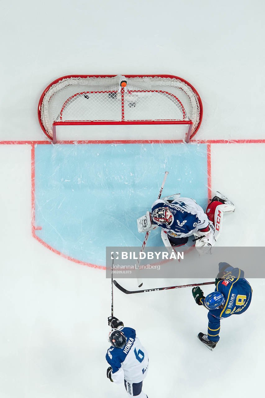 Linus Johansson of Sweden scores 1-0 behind goalkeeper