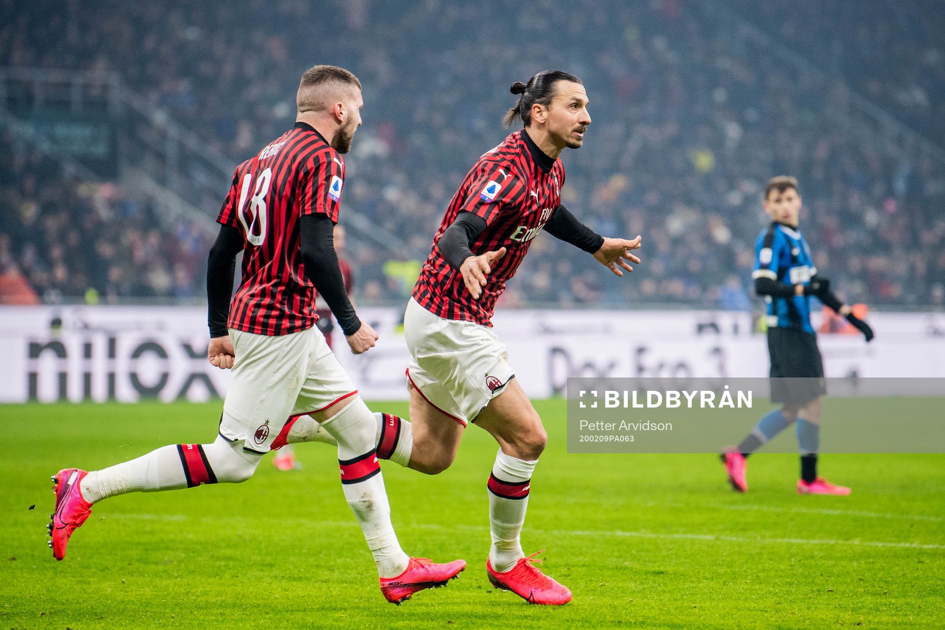 Zlatan Ibrahimovic and Ante Rebic of Milan celebrate