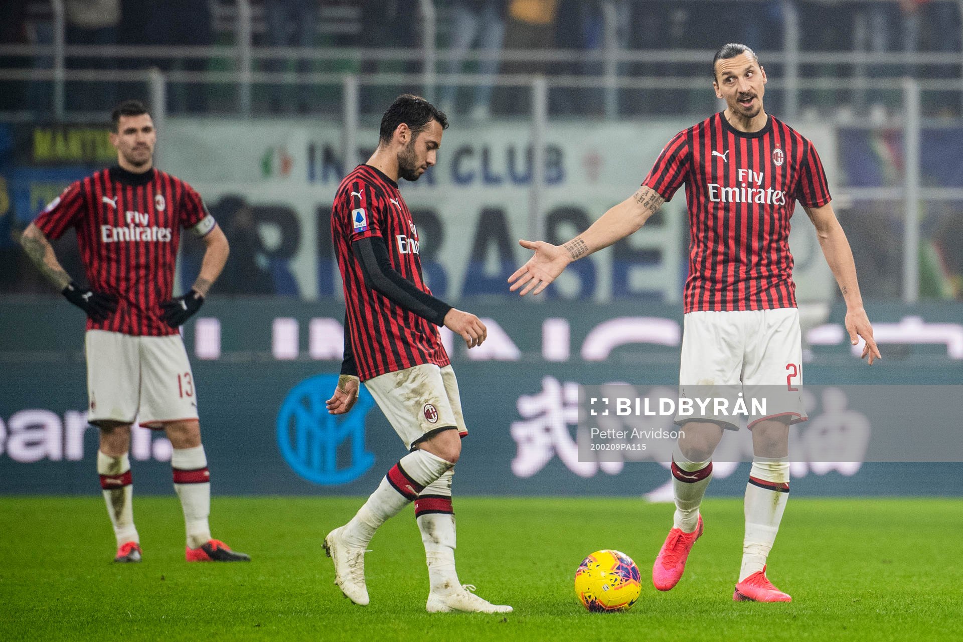 Hakan Calhanoglu and Zlatan Ibrahimovic of Milan during the Serie A match between Inter and Milan on February 9, 2020 in Milano.