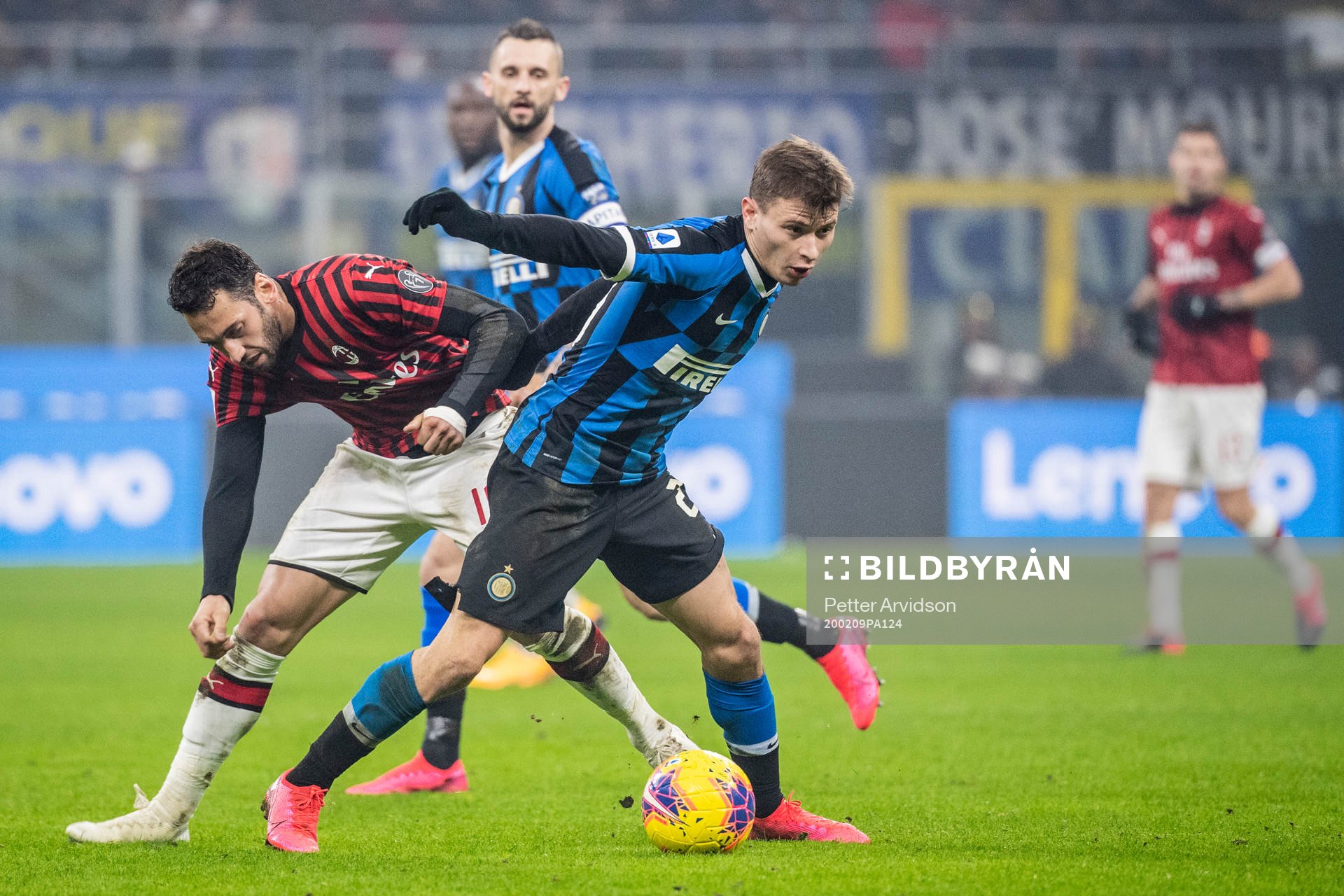 Hakan Calhanoglu of Milan and Nicolo Barella of Inter