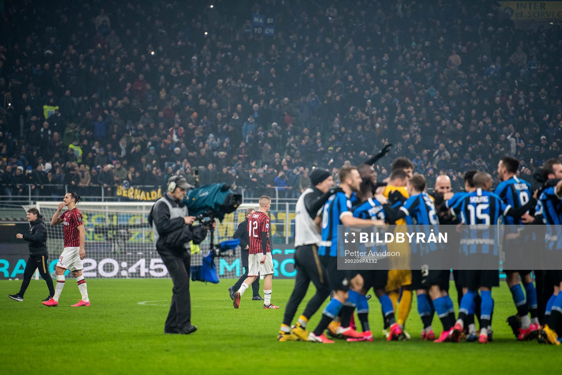 Zlatan Ibrahimovic of Milan looks dejected as players of