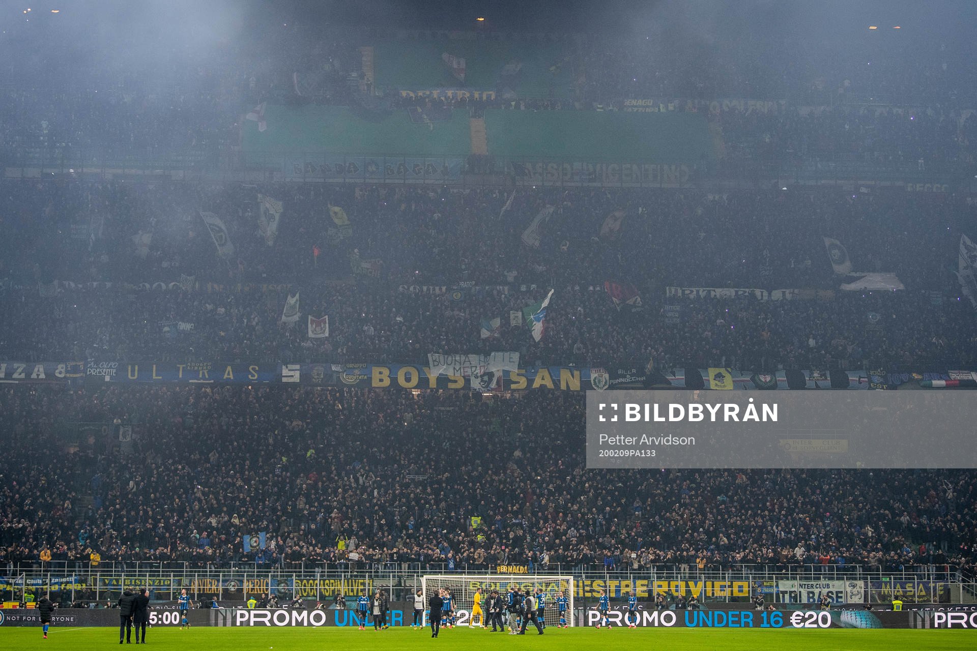 Players of Inter celebrate in front of their supporters