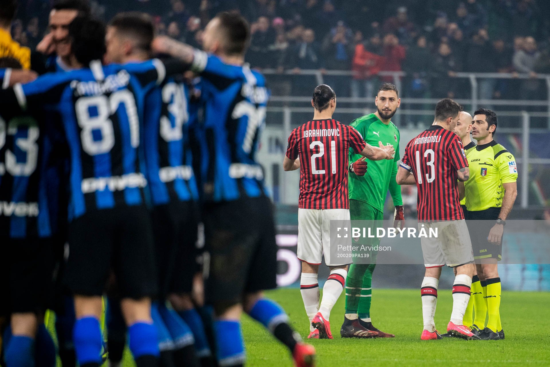 Zlatan Ibrahimovic and goalkeeper Gianluigi Donnarumma of
