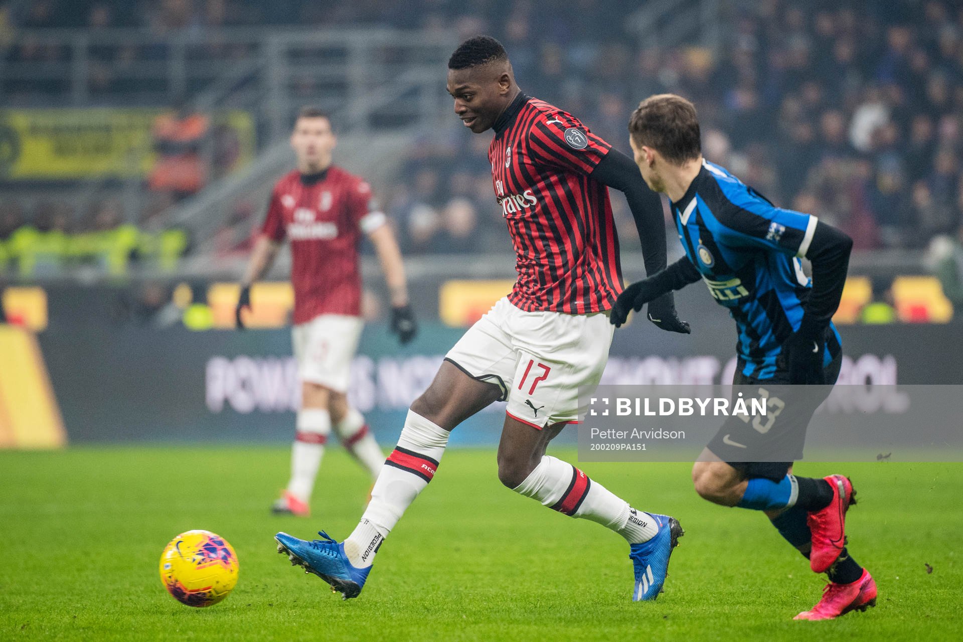 Rafael Leao of Milan and Nicolo Barella of Inter during the Serie A match between Inter and Milan on February 9, 2020 in Milano.