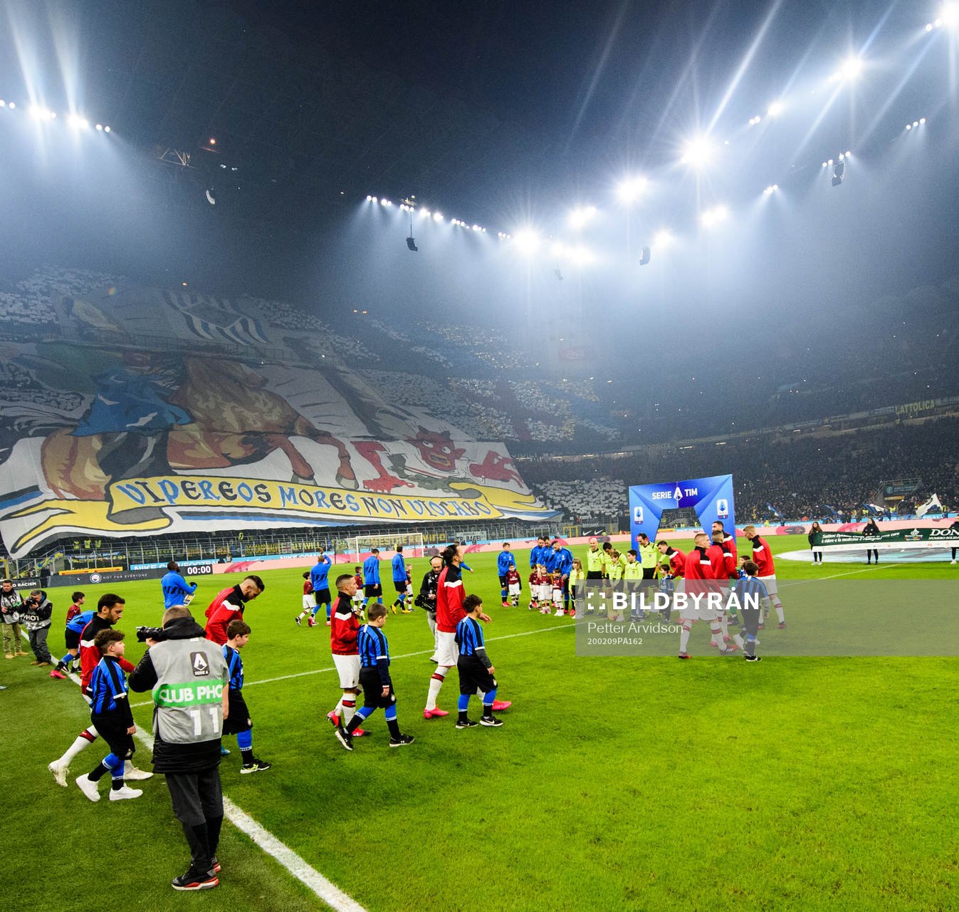 Players of Inter and Milan enters the field