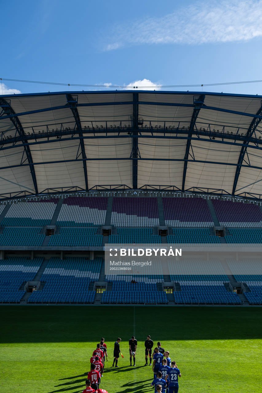 The teams enter the arena