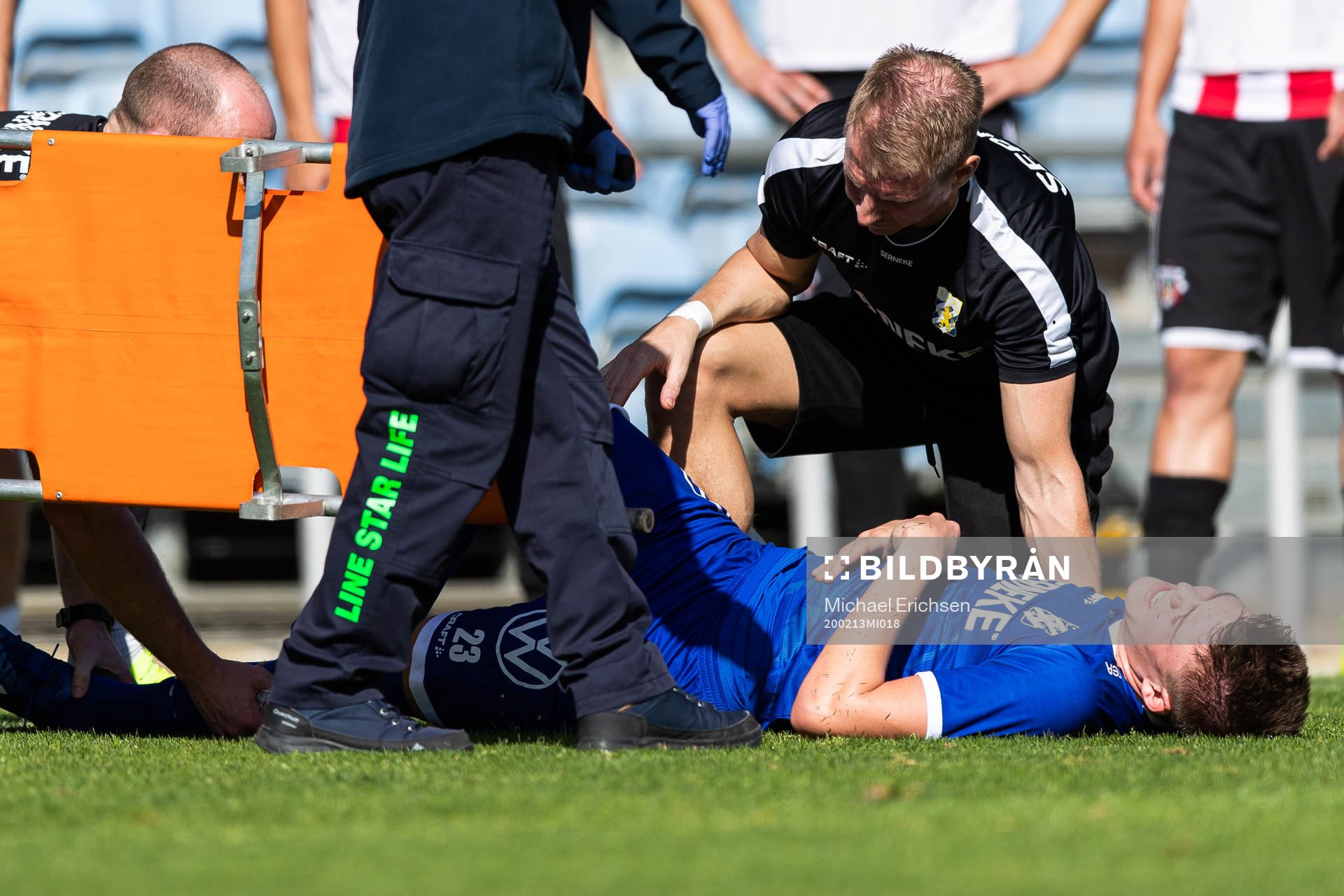Emil Holm of IFK Göteborg is seen to by medical staff due