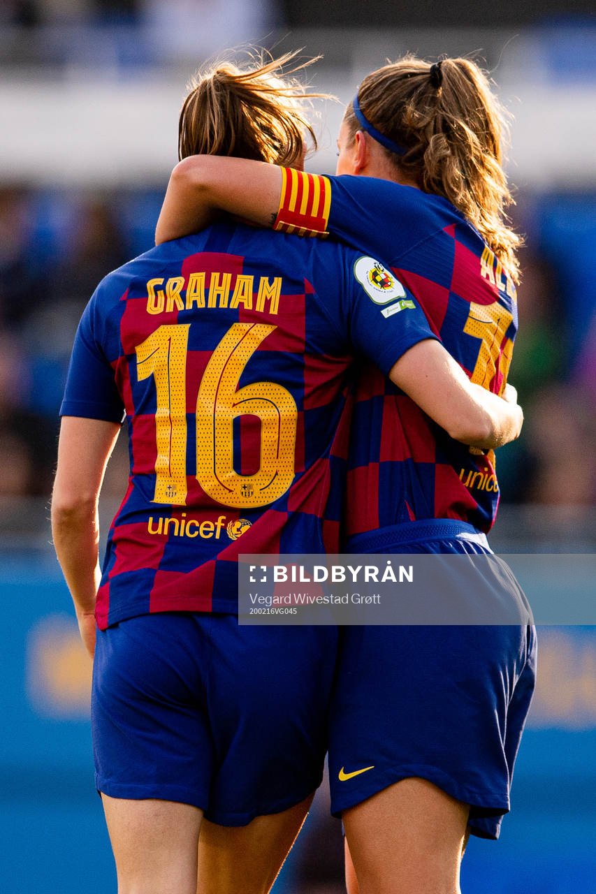 Caroline Graham Hansen of Barcelona celebrates with teammate Alexia Putellas after scoring 1-0 during the Primera Division Femenina football match between Barcelona and Sporting Huelva on February 16, 2020 in Barcelona.