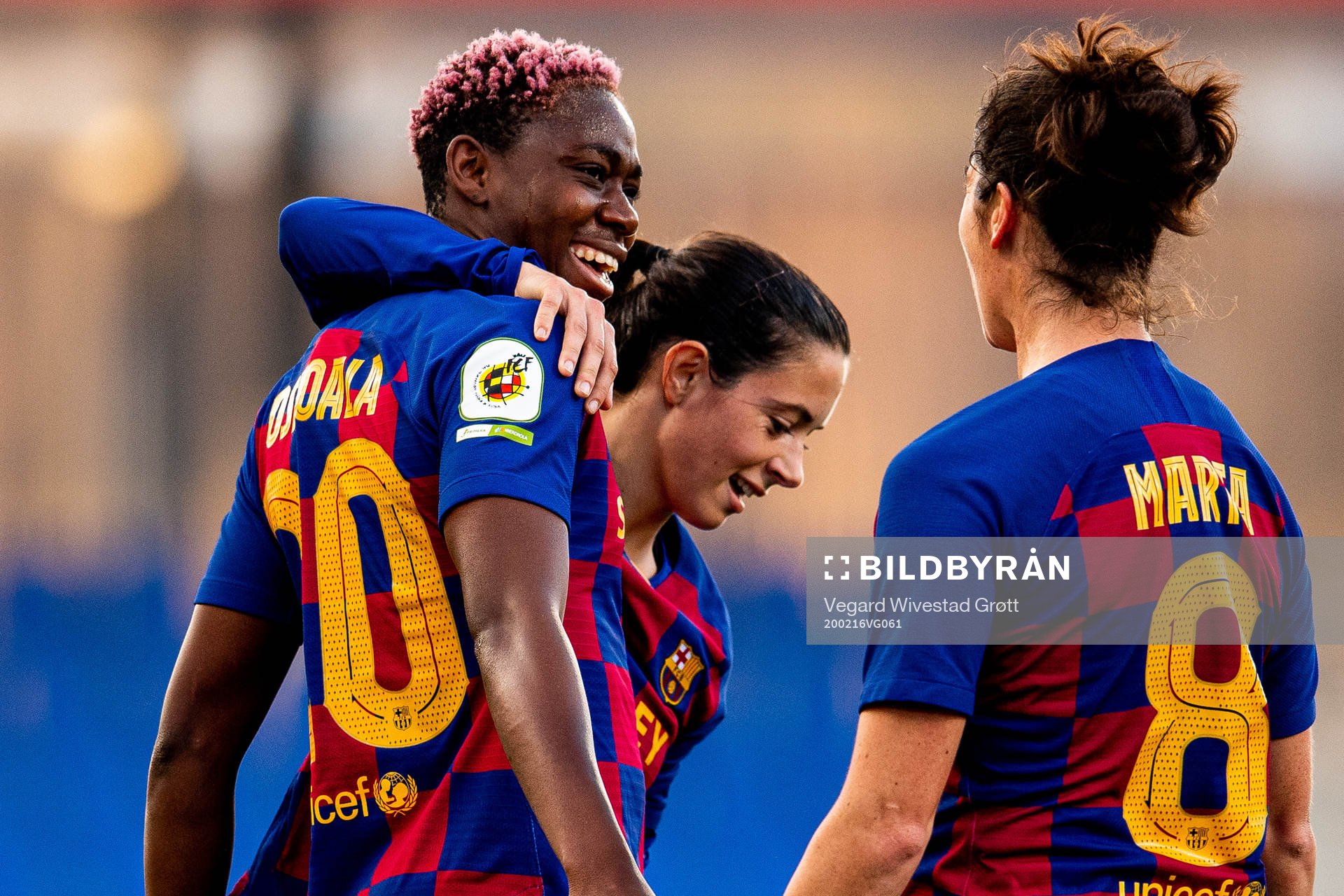 Asisat Oshoala of Barcelona celebrates with teammates