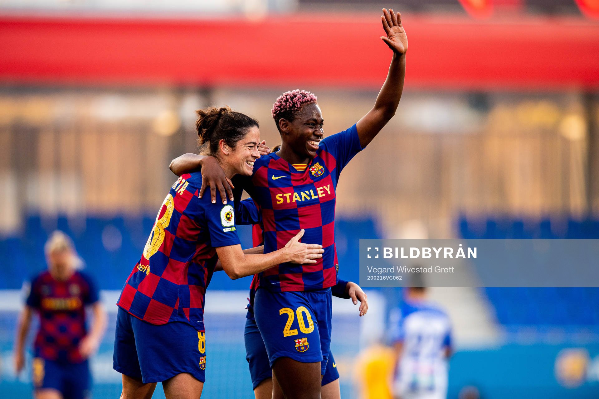 Asisat Oshoala of Barcelona celebrates with Marta Torrejon