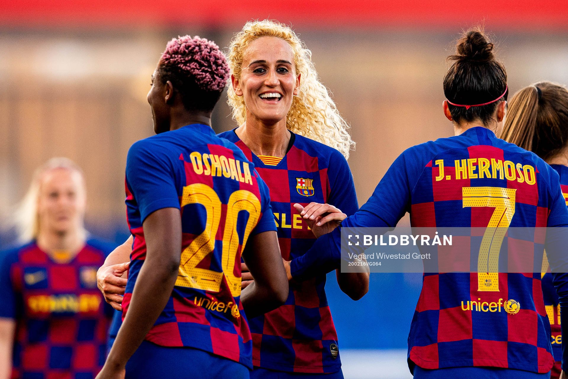 Asisat Oshoala of Barcelona celebrates with teammate Kheira