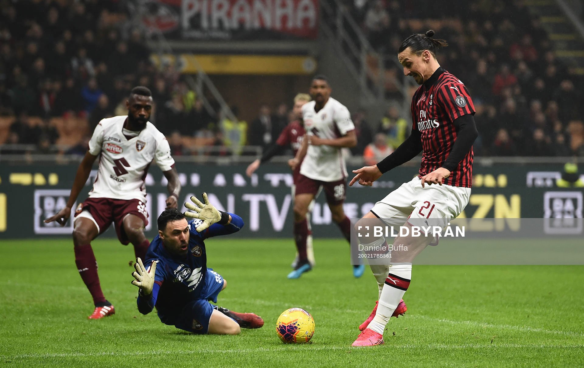 Zlatan Ibrahimovic of Milan against goalkeeper Salvatore