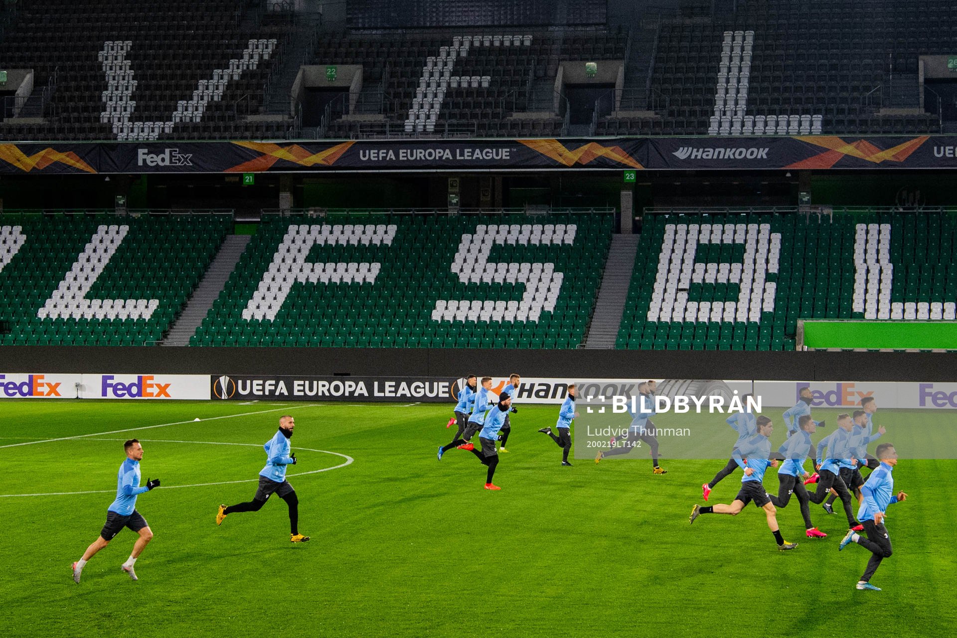 The team warms up