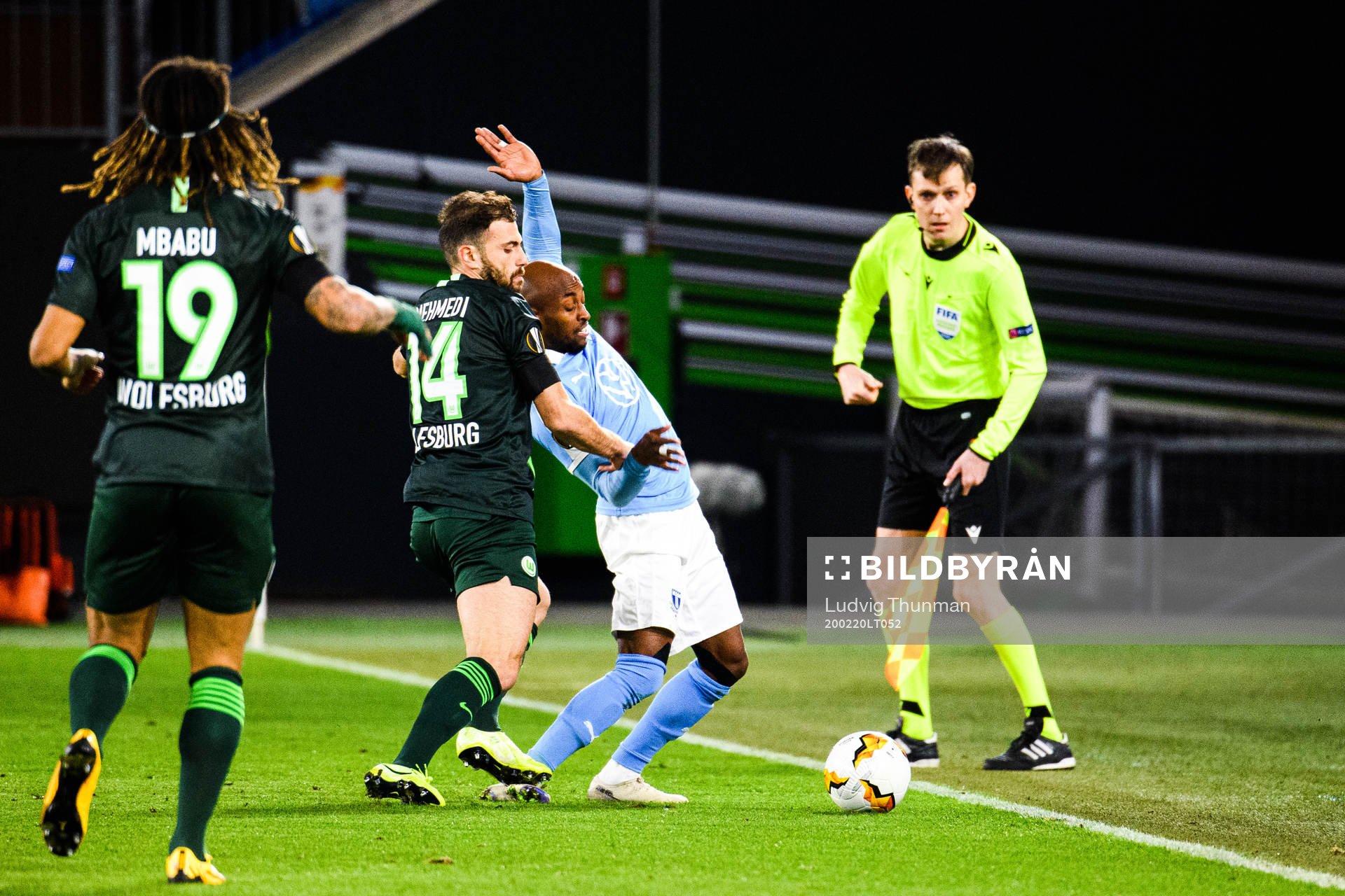 Fouad Bachirou of Malmö FF and Admir Mehmedi of Wolfsburg during the Europa League round of 32 match between Wolfsburg and Malmö FF on February 20, 2020 in Wolfsburg.