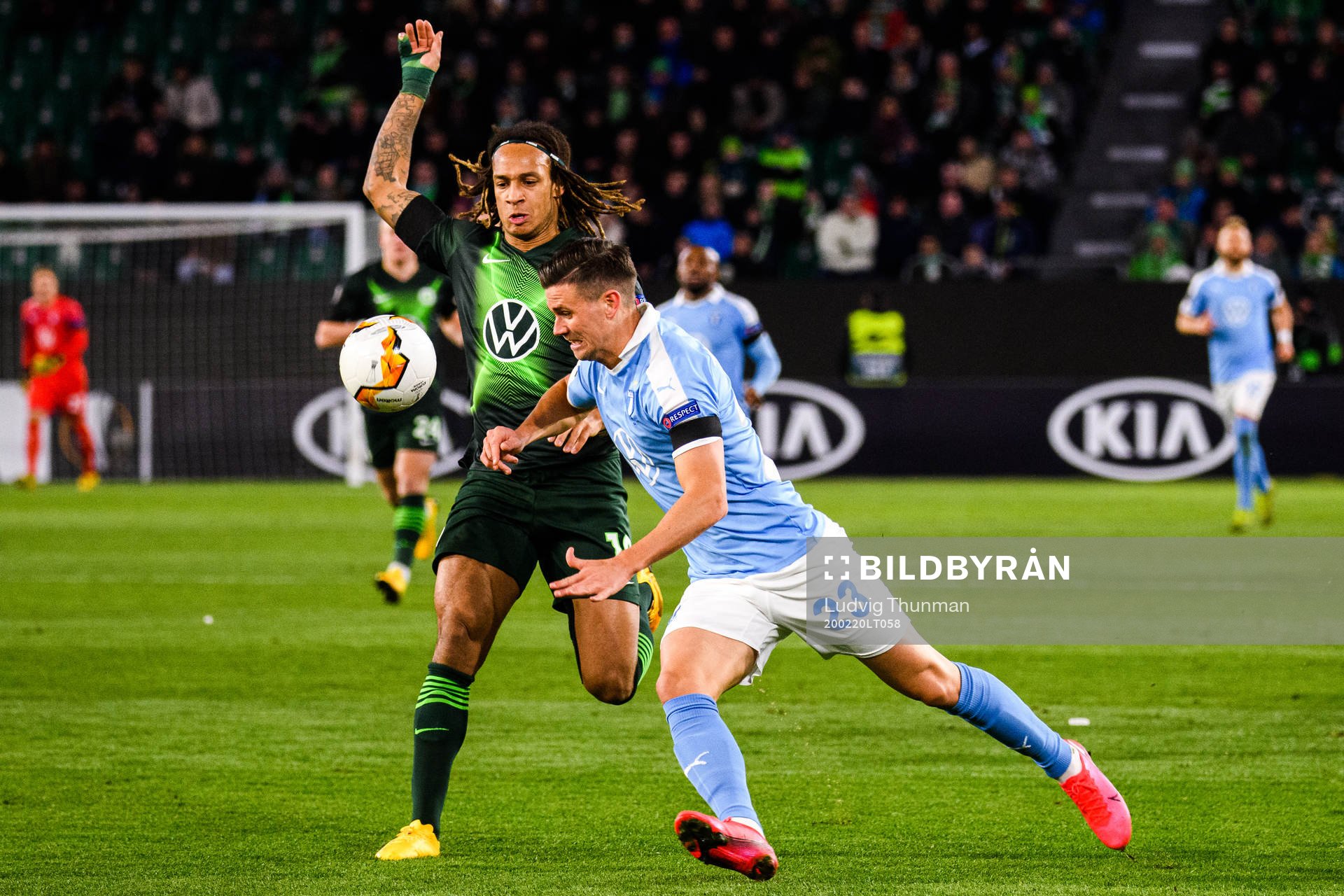 Kevin Mbabu of Wolfsburg and Marcus Antonsson of Malmö FF
