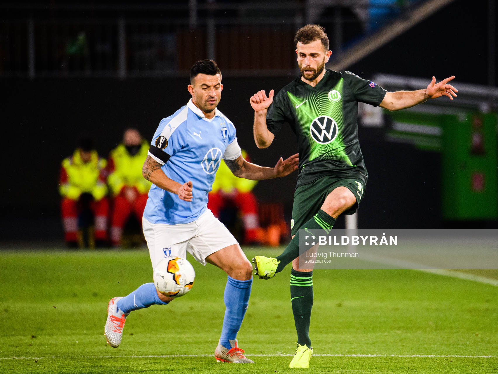 Behrang Safari of Malmö FF and Admir Mehmedi of Wolfsburg during the Europa League round of 32 match between Wolfsburg and Malmö FF on February 20, 2020 in Wolfsburg.