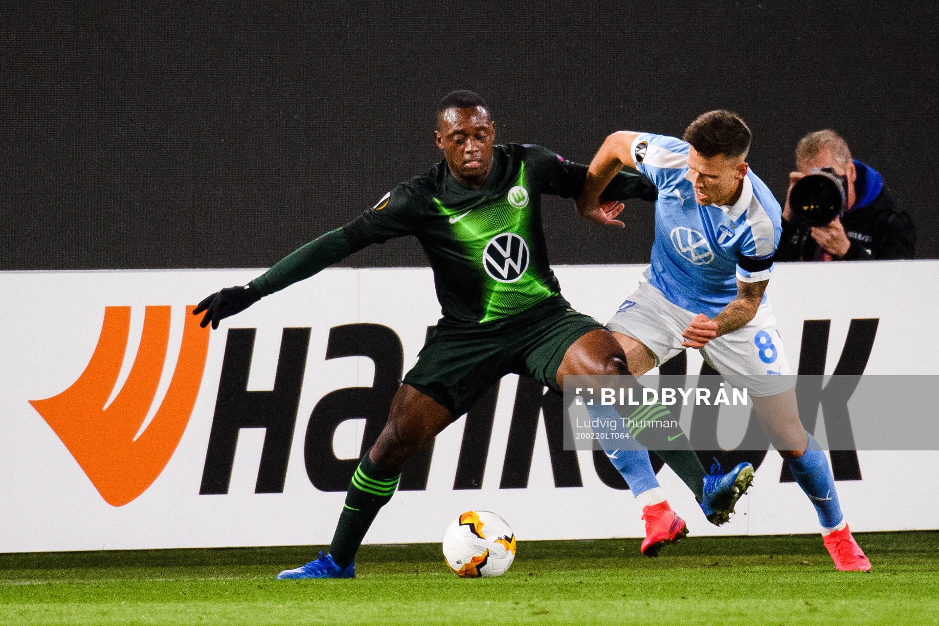 Jérôme Roussillon of Wolfsburg and Arnór Traustason of