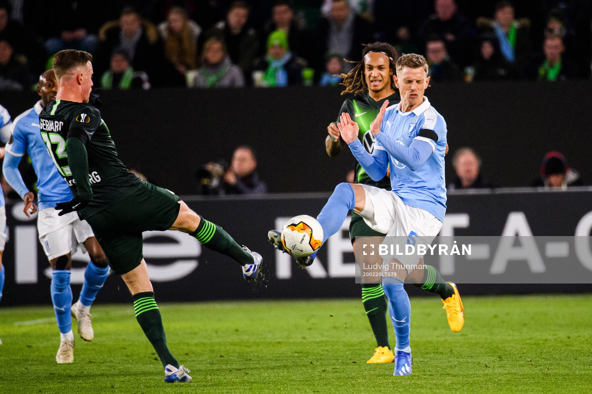 Yannick Gerhardt of Wolfsburg and Sören Rieks of Malmö FF during the Europa League round of 32 match between Wolfsburg and Malmö FF on February 20, 2020 in Wolfsburg.
