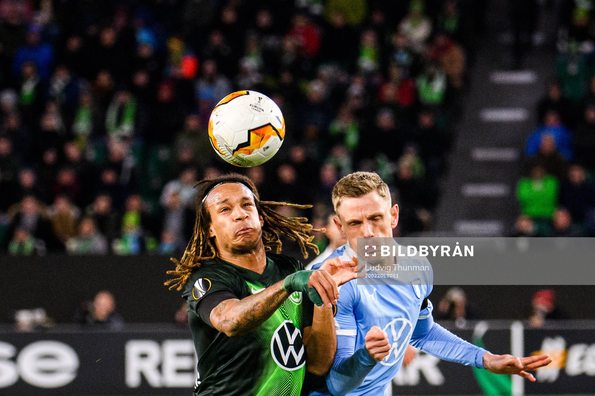 Sören Rieks of Malmö FF and Kevin Mbabu of Wolfsburg