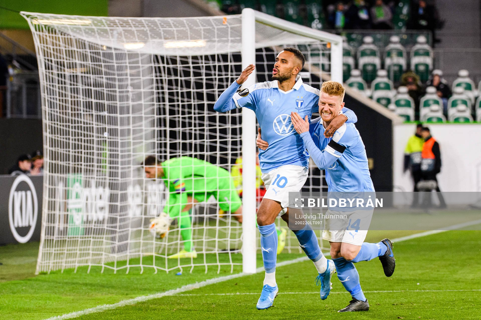 Isaac Kiese Thelin and Anders Christiansen of Malmö FF celebrate the 0-1 goal during the Europa League round of 32 match between Wolfsburg and Malmö FF on February 20, 2020 in Wolfsburg.
