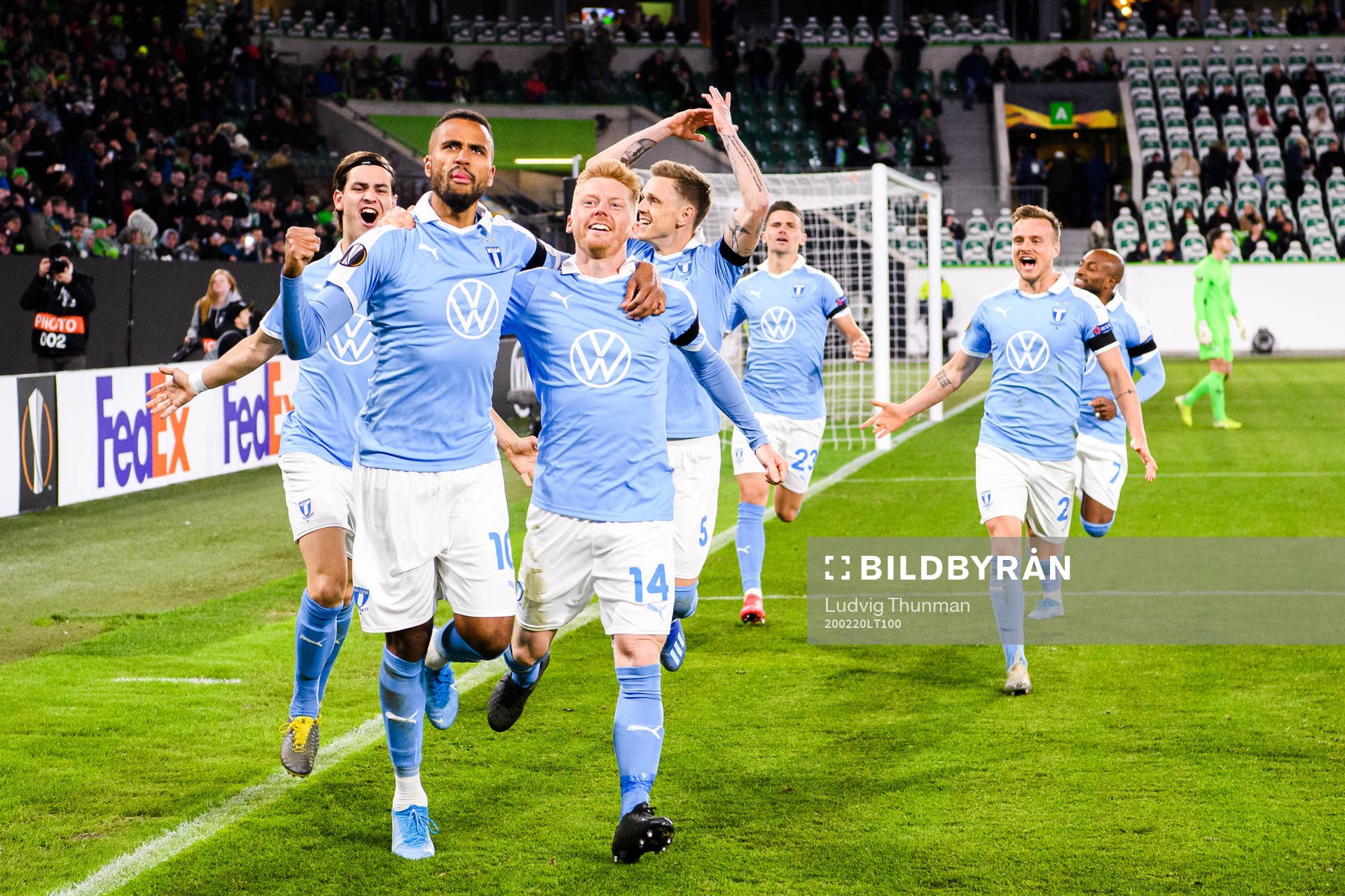 Isaac Kiese Thelin and Anders Christiansen of Malmö FF celebrate the 0-1 goal during the Europa League round of 32 match between Wolfsburg and Malmö FF on February 20, 2020 in Wolfsburg.