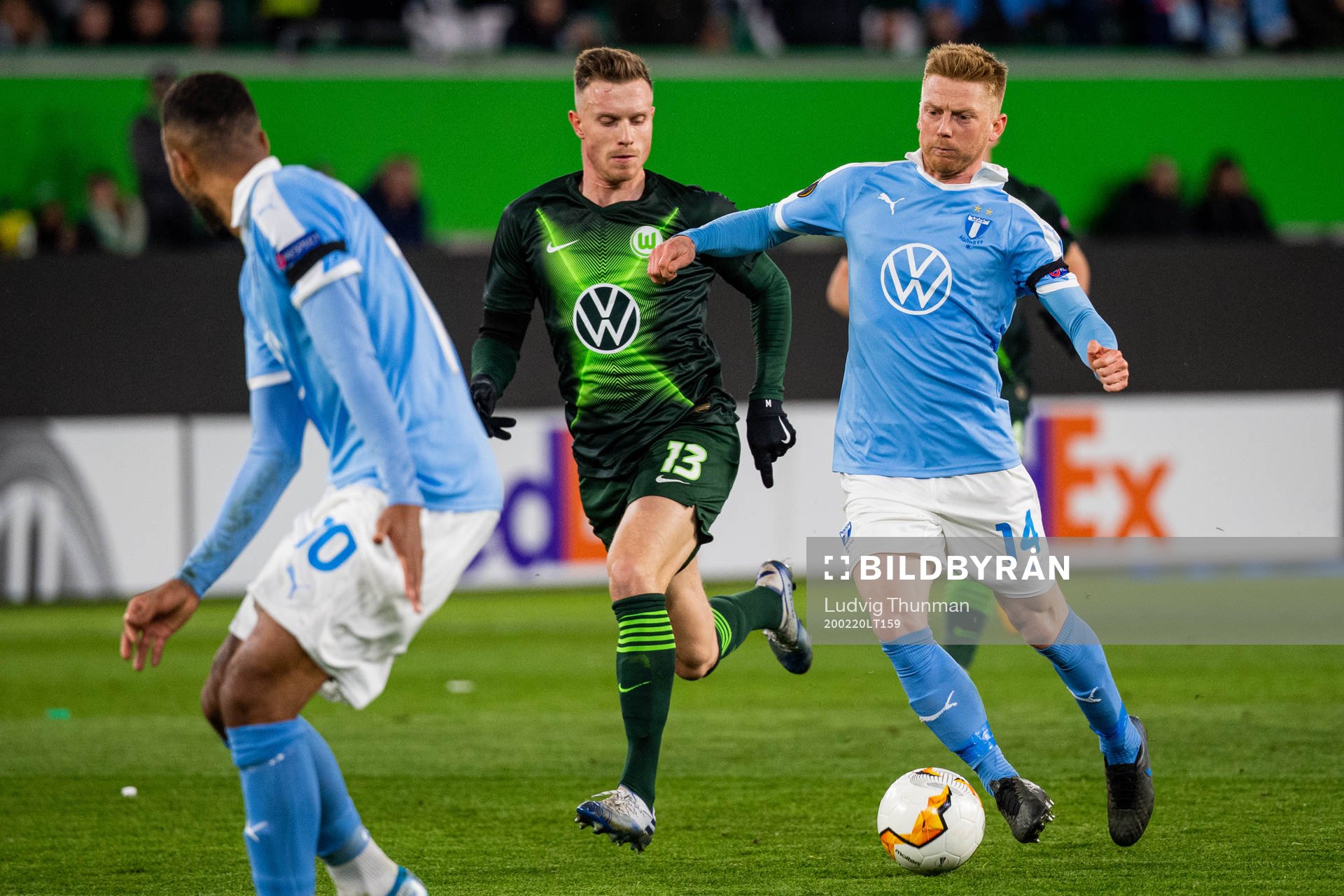 Anders Christiansen of Malmö FF and Yannick Gerhardt of Wolfsburg during the Europa League round of 32 match between Wolfsburg and Malmö FF on February 20, 2020 in Wolfsburg.