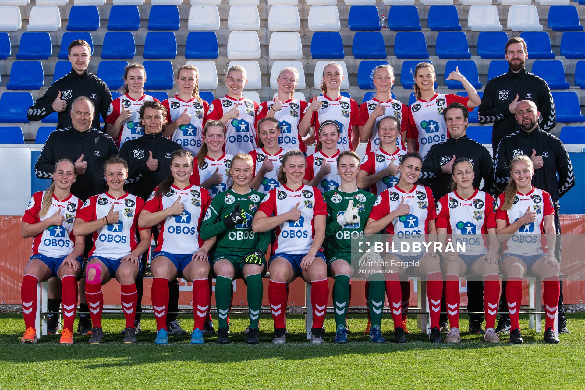 Lyn poses for a team photo