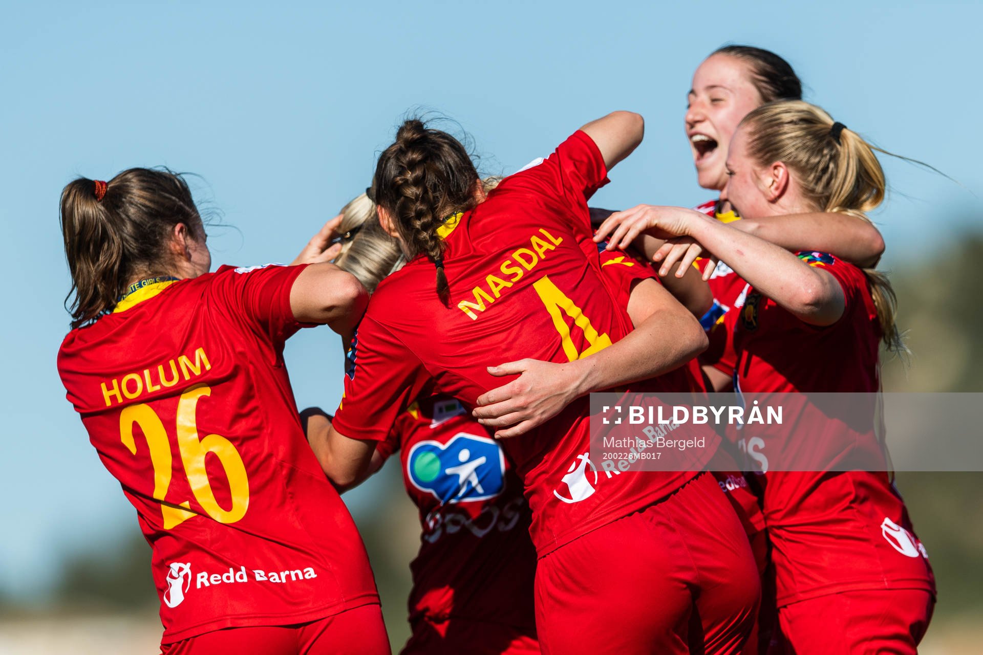 Rebecka Holum and Synne Masdal celebrate with team mates