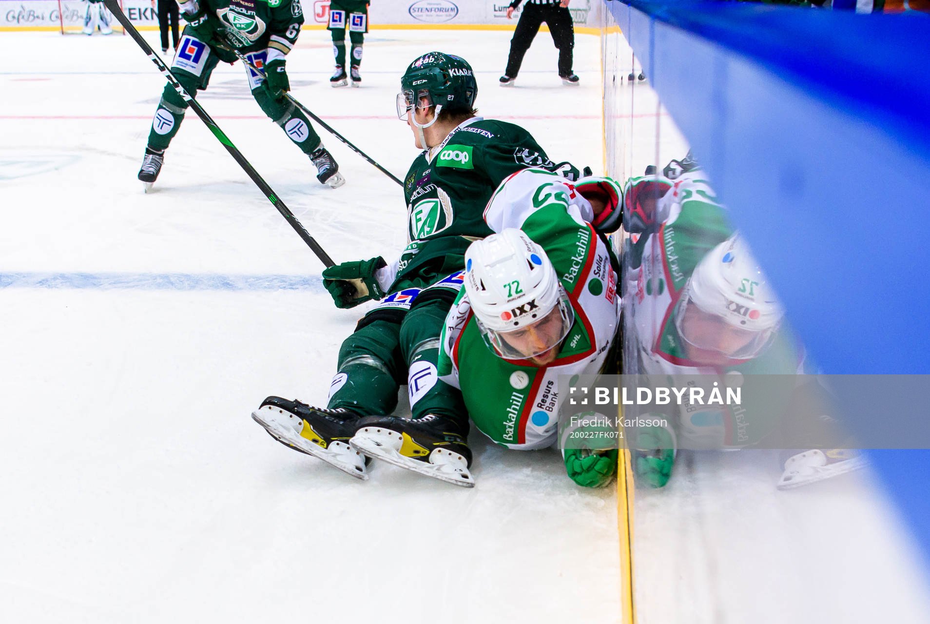 Färjestads Oskar Bäck och Rögles Daniel Zaar