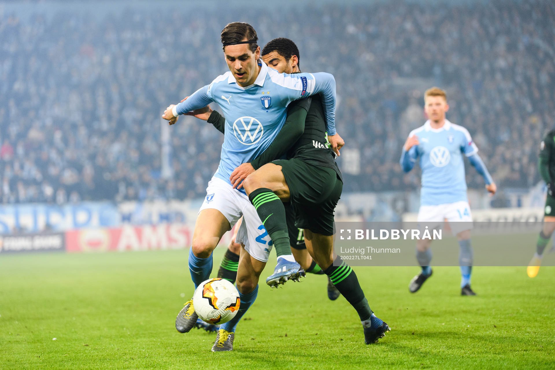 Adi Nalic of Malmö FF and Paulo Otavio of Wolfsburg