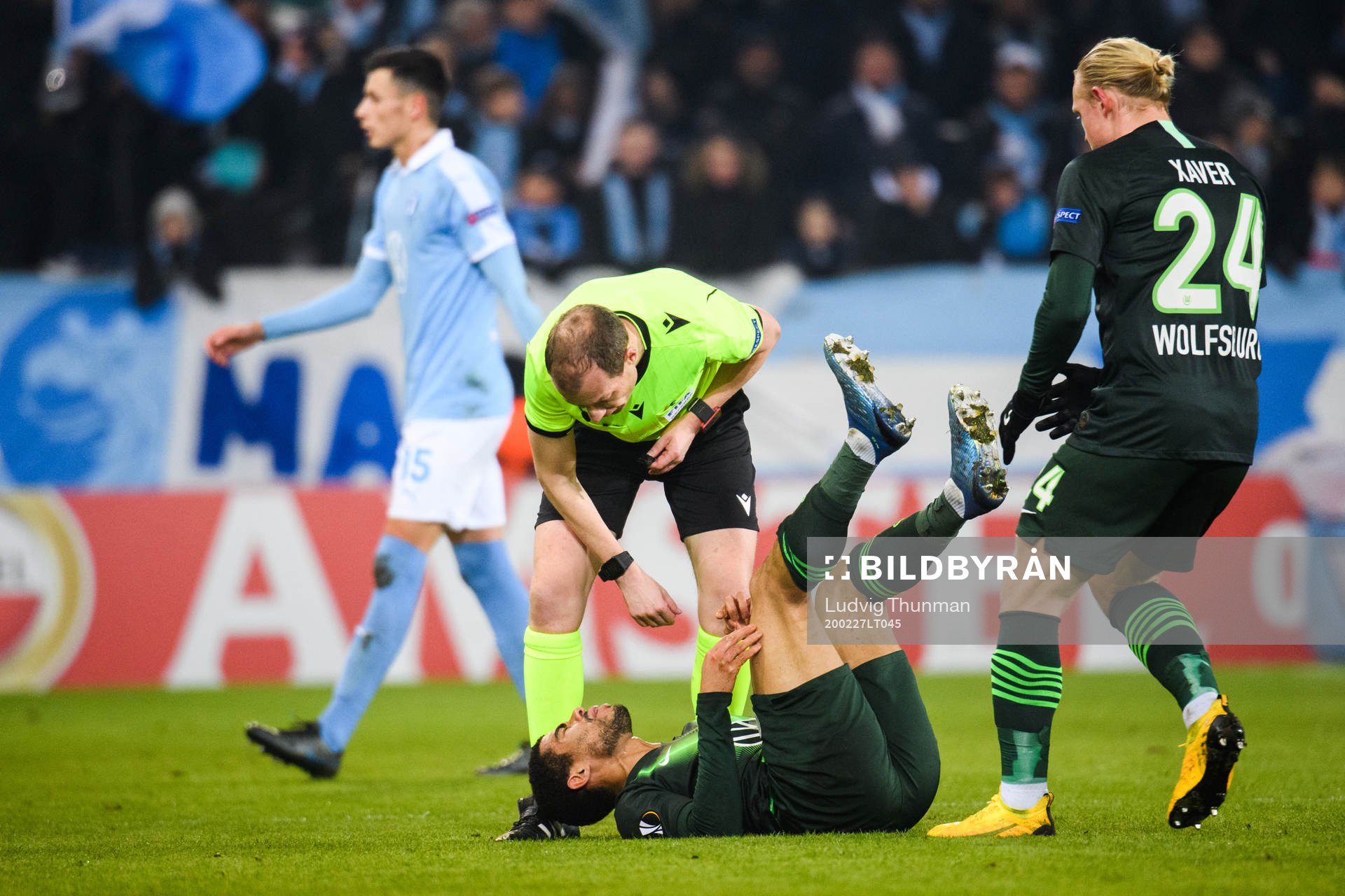 Paulo Otavio of Wolfsburg in pain