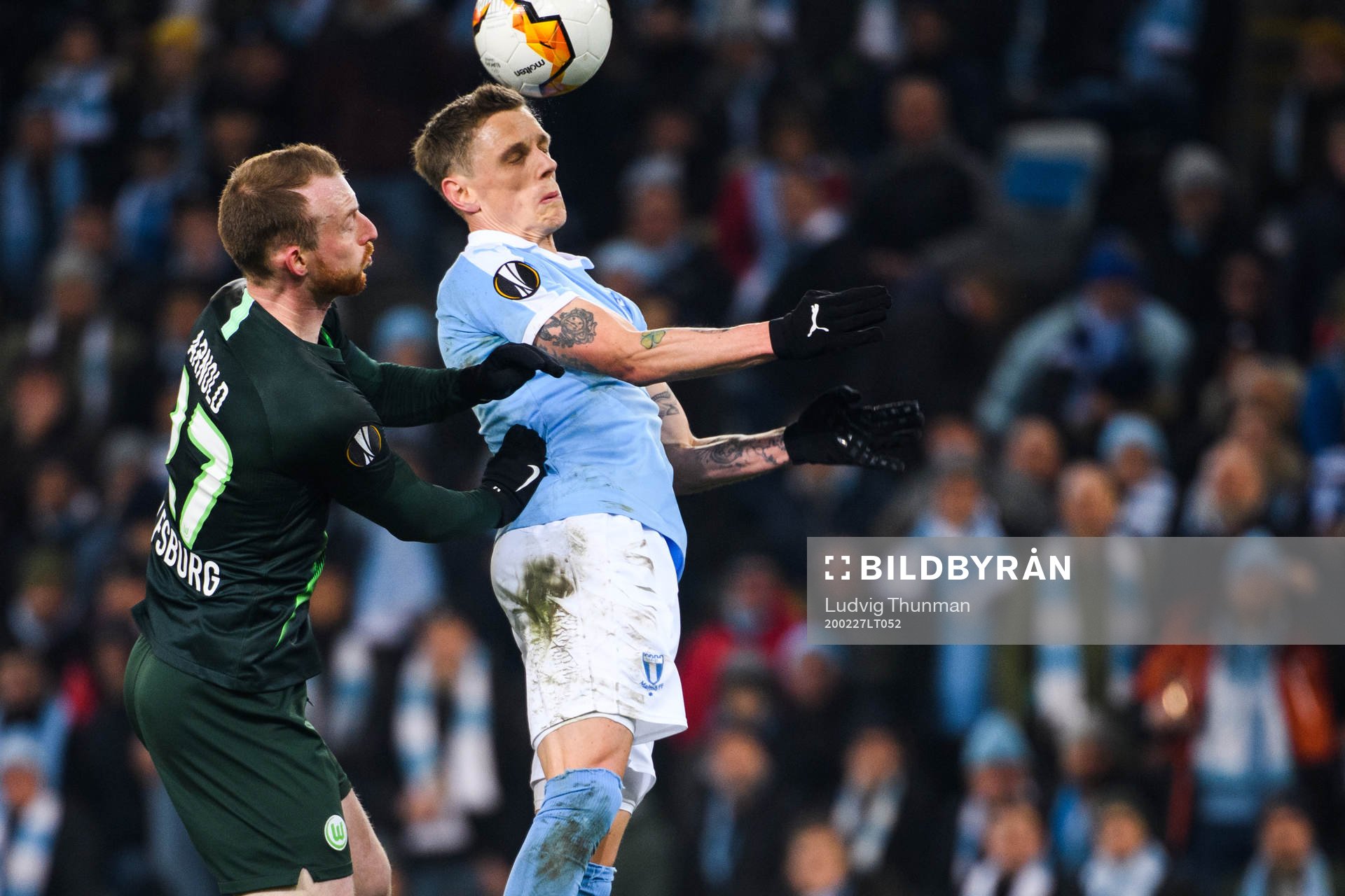 Maximilian Arnold of Wolfsburg and Sören Rieks of Malmö FF