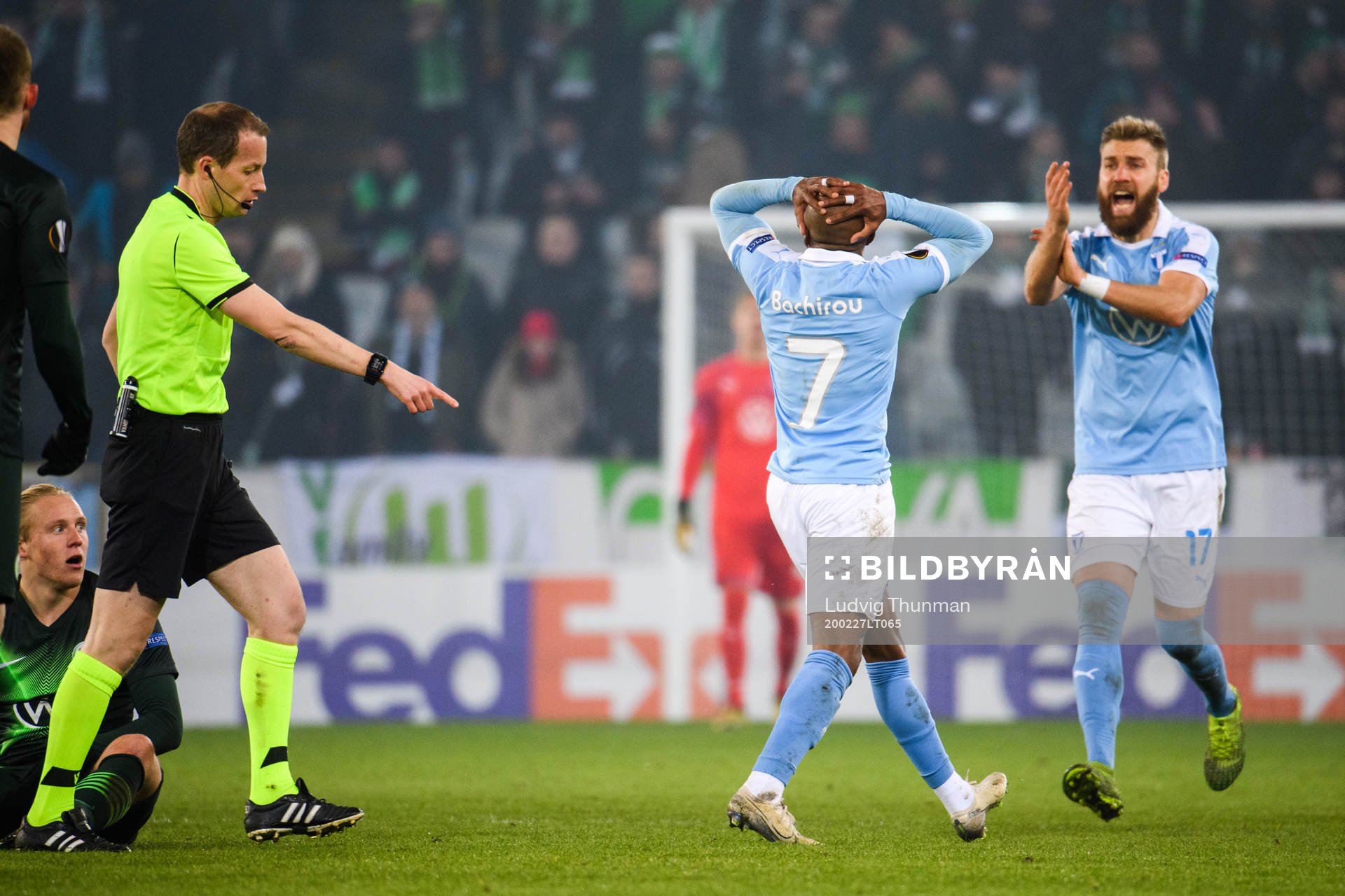 Fouad Bachirou and Rasmus Bengtsson of Malmö FF react