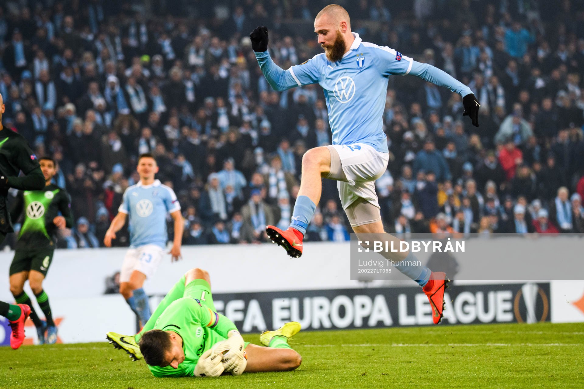Jo Inge Berget of Malmö FF and goalkeeper Koen Casteels of