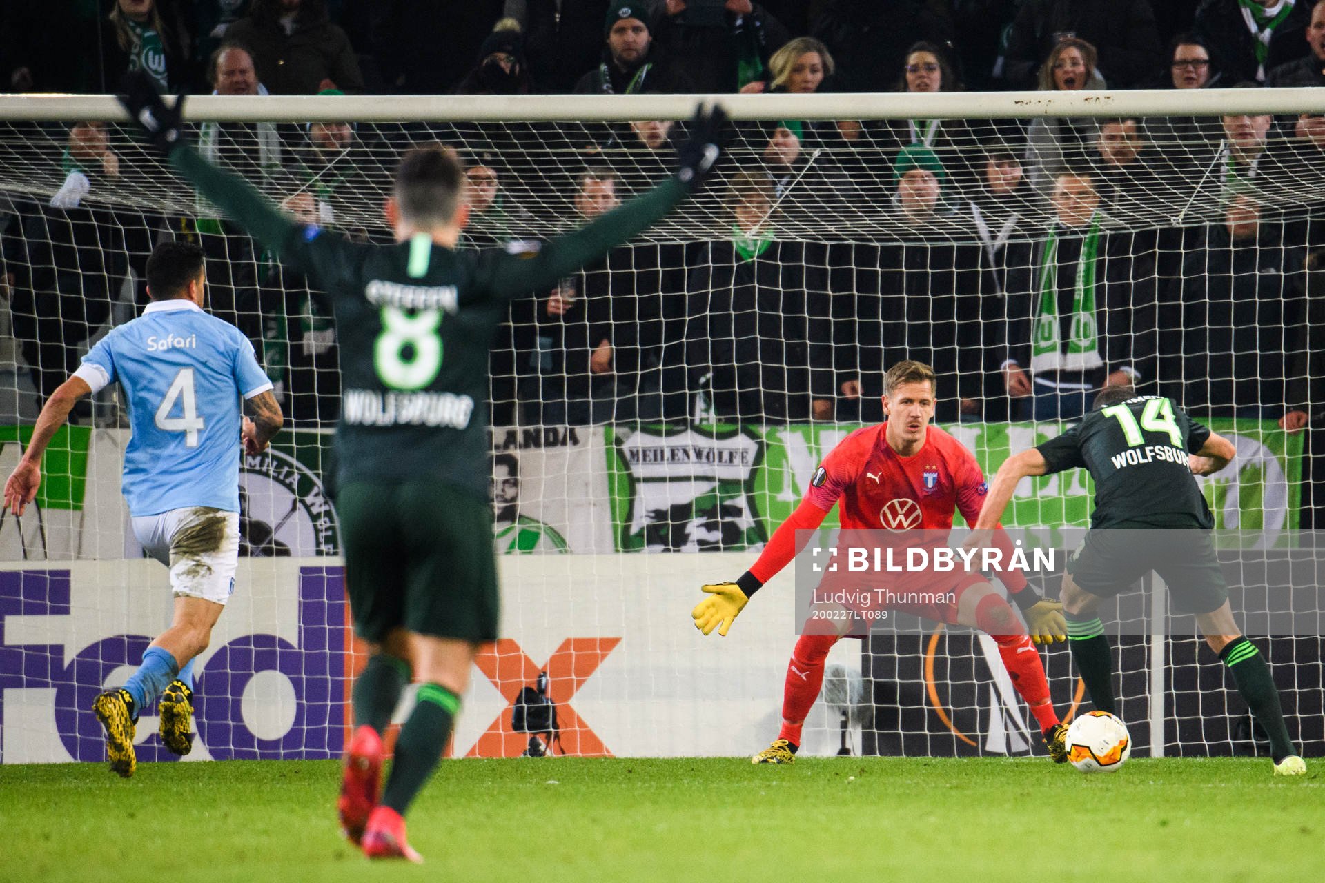 Goalkeeper Johan Dahlin of Malmö FF and Admir Mehmedi of Wolfsburg during the Europa Leauge match between Malmö FF and Wolfsburg on February 27, 2020 in Malmö.