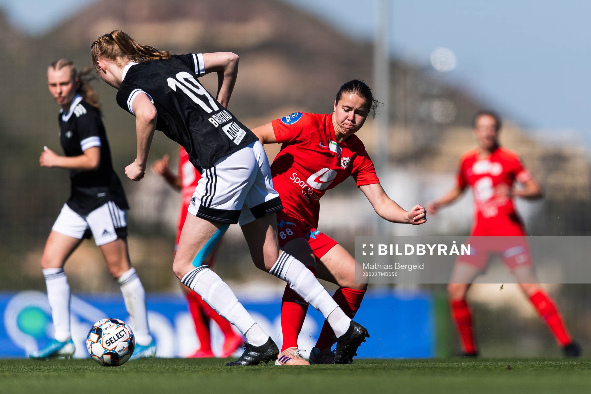 Emilie Bragstad of Rosenborg and Tanja Løfshus of Arna-Bjørnar compete for the ball during a pre-season friendly football match between Arna-Bjørnar and Rosenborg on February 27, 2020 in La Manga.