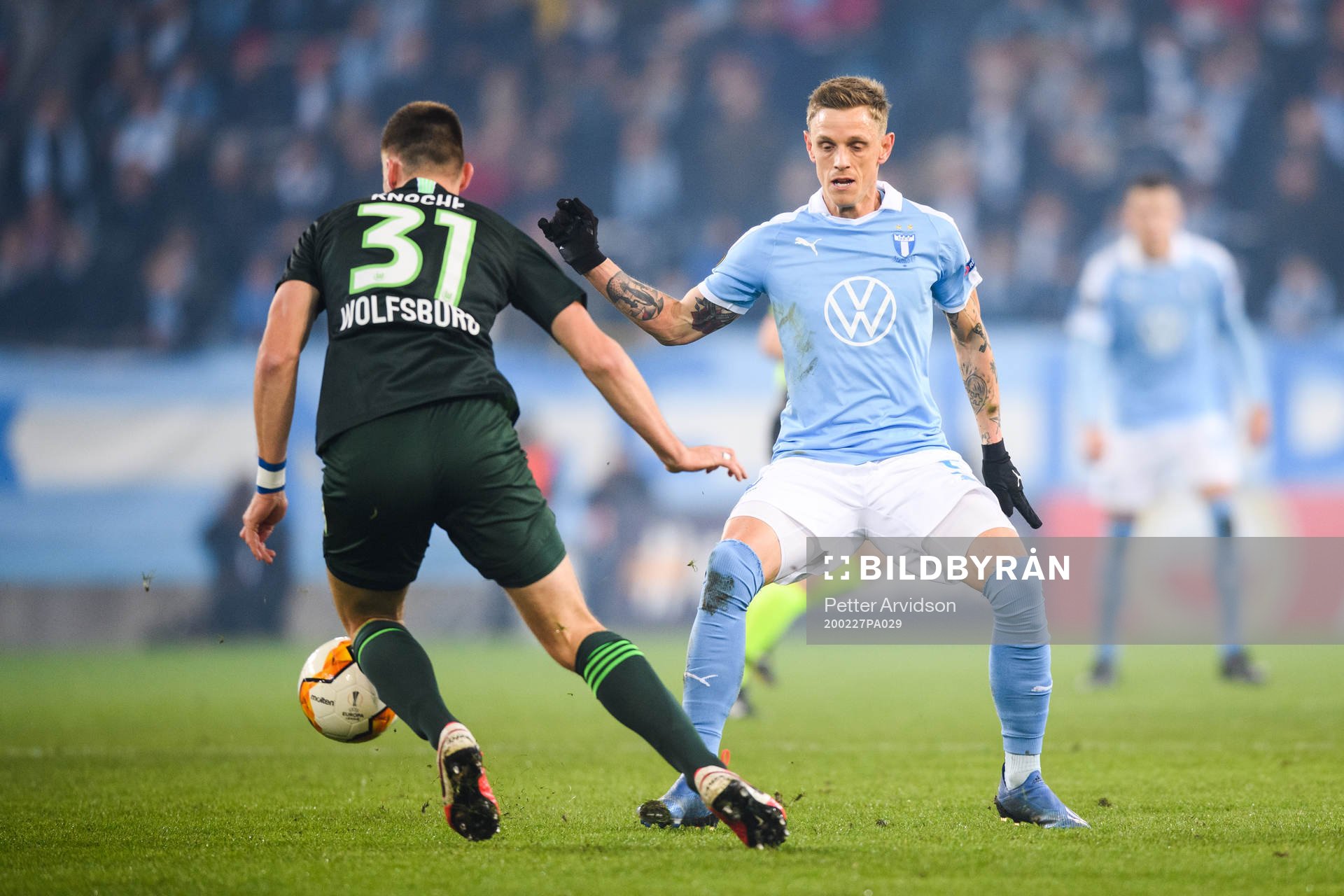Robin Knoche of Wolfsburg and Sören Rieks of Malmö FF during of the Europa Leauge match between Malmö FF and Wolfsburg on February 27, 2020 in Malmö.