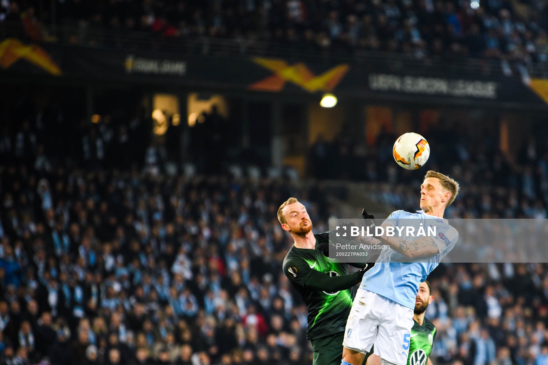 Maximilian Arnold of Wolfsburg and Sören Rieks of Malmö FF