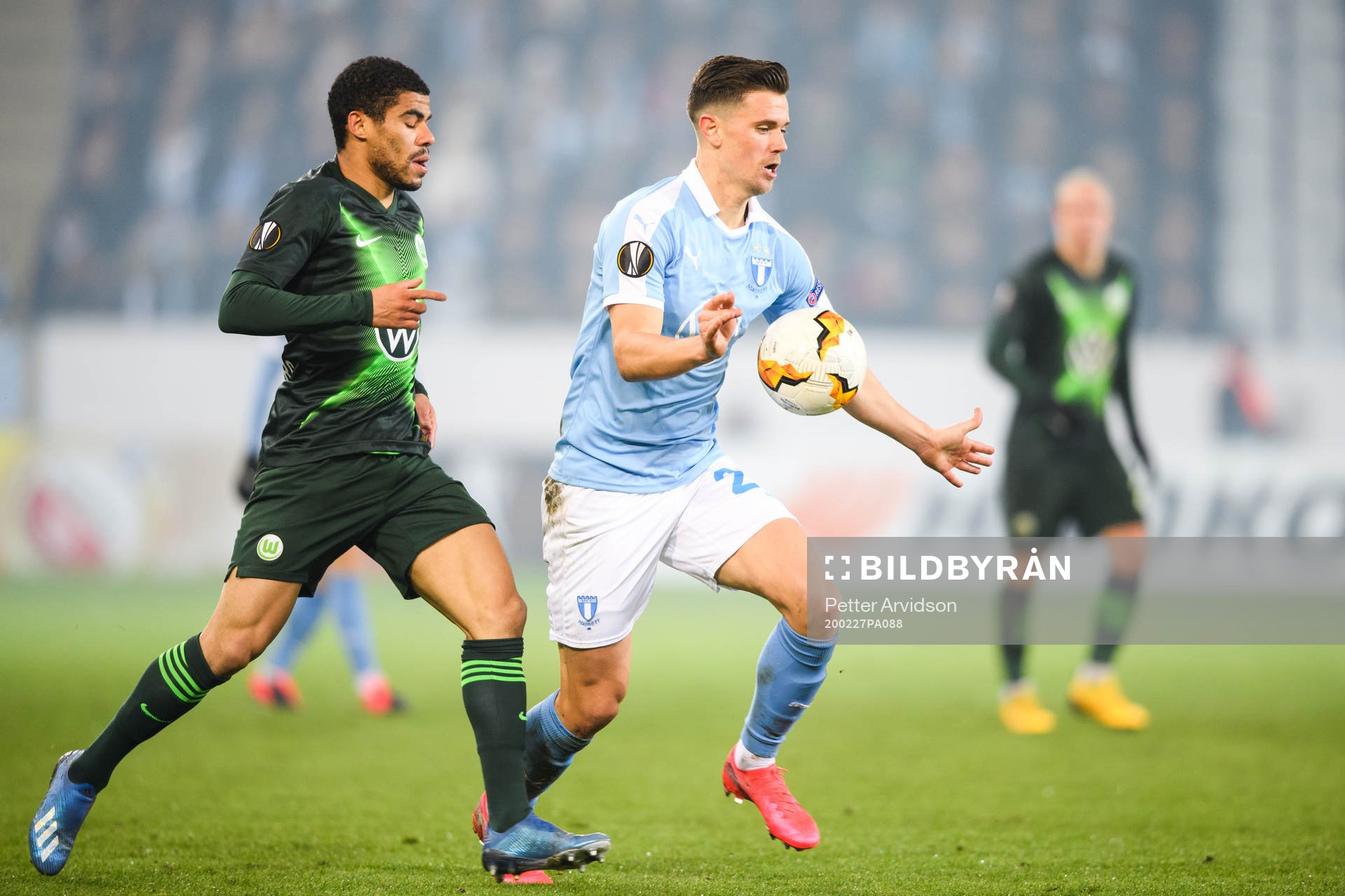 Paulo Otavio of Wolfsburg and Marcus Antonsson of Malmö FF