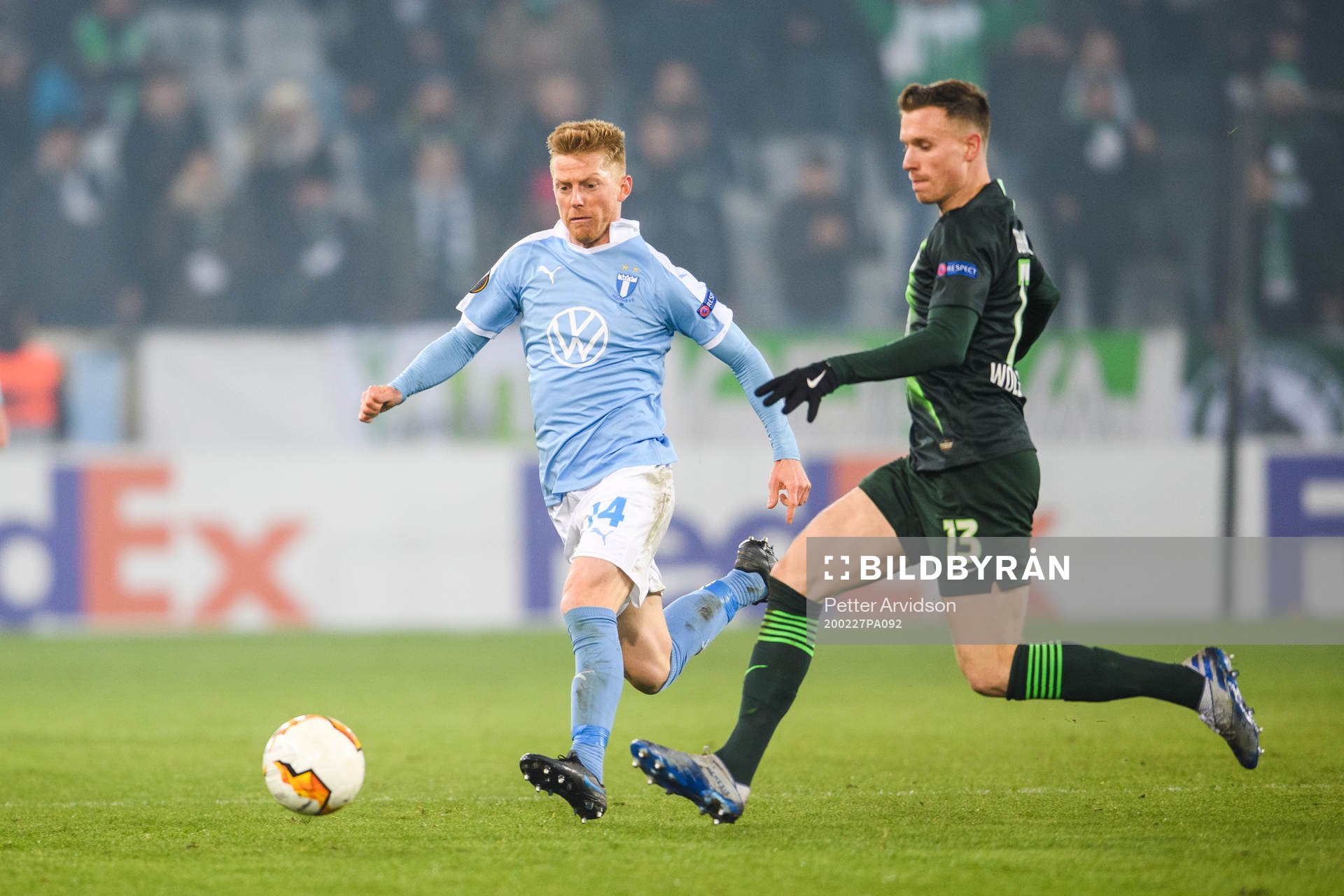 Anders Christiansen of Malmö FF and Yannick Gerhardt of Wolfsburg during of the Europa Leauge match between Malmö FF and Wolfsburg on February 27, 2020 in Malmö.