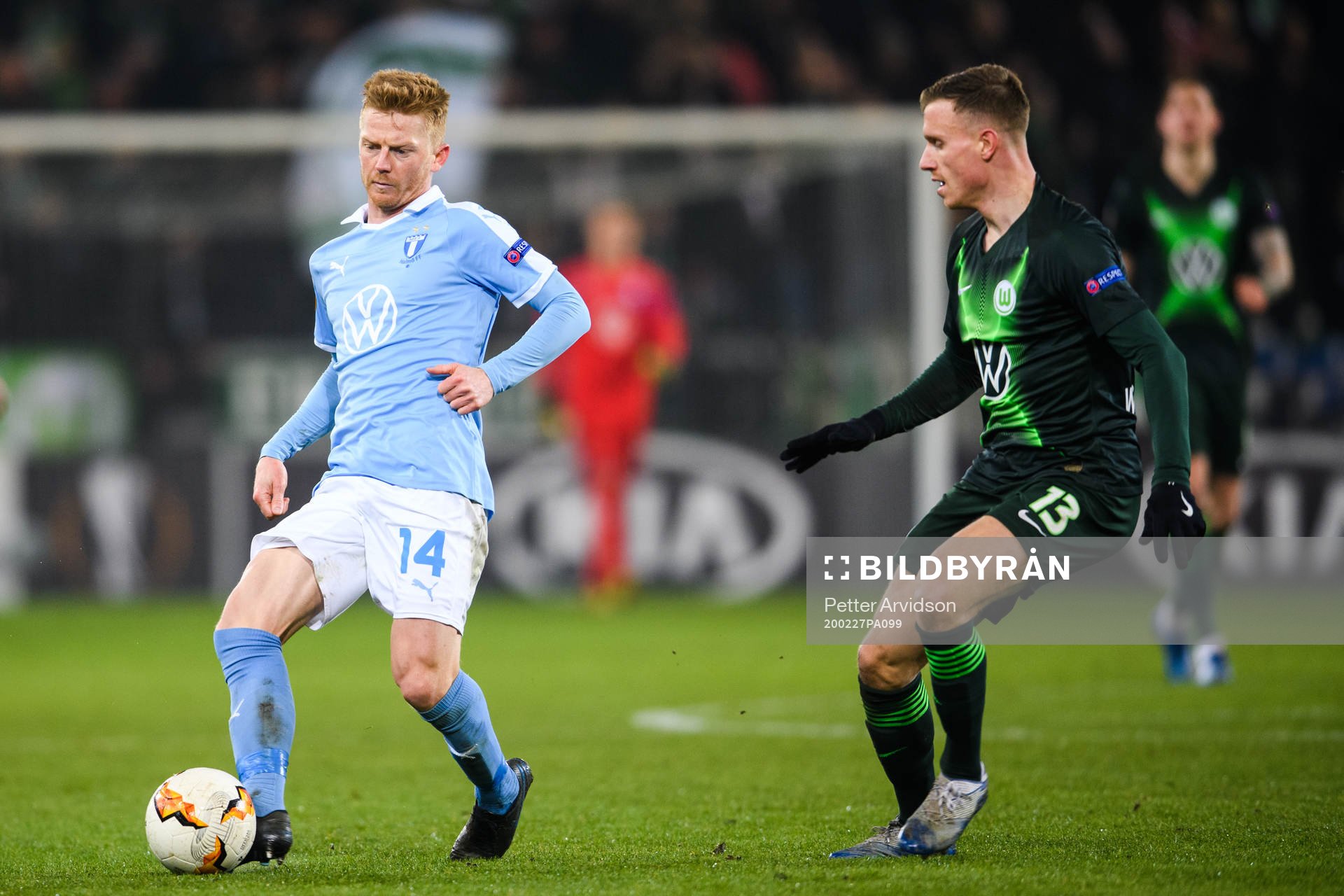 Anders Christiansen of Malmö FF and Yannick Gerhardt of Wolfsburg during of the Europa Leauge match between Malmö FF and Wolfsburg on February 27, 2020 in Malmö.