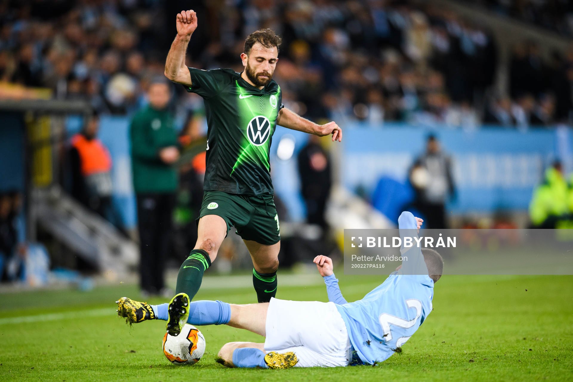 Admir Mehmedi of Wolfsburg and Lasse Nielsen of Malmö FF