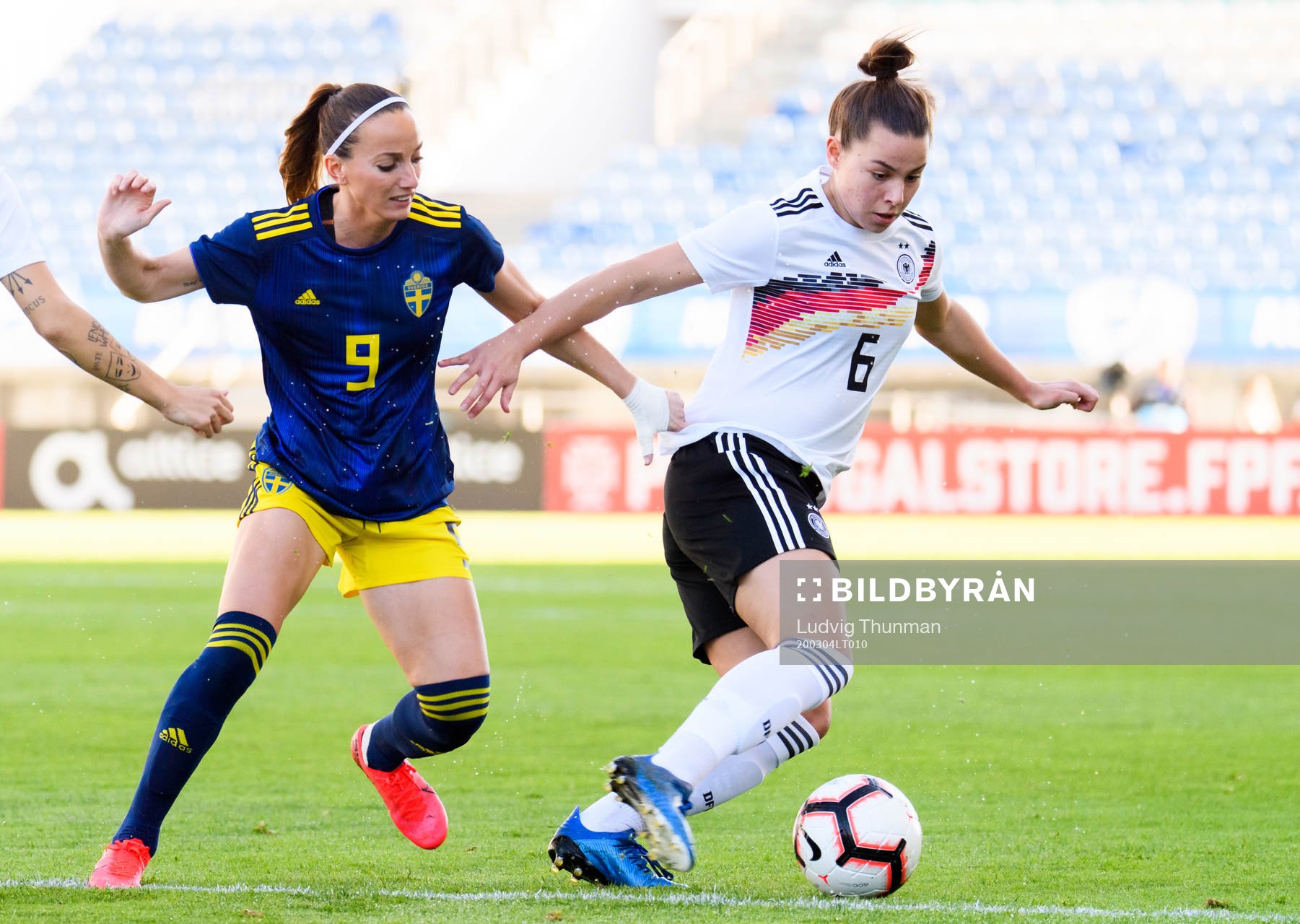 Kosovare Asllani of Sweden and Lena Sophie Oberdorf of