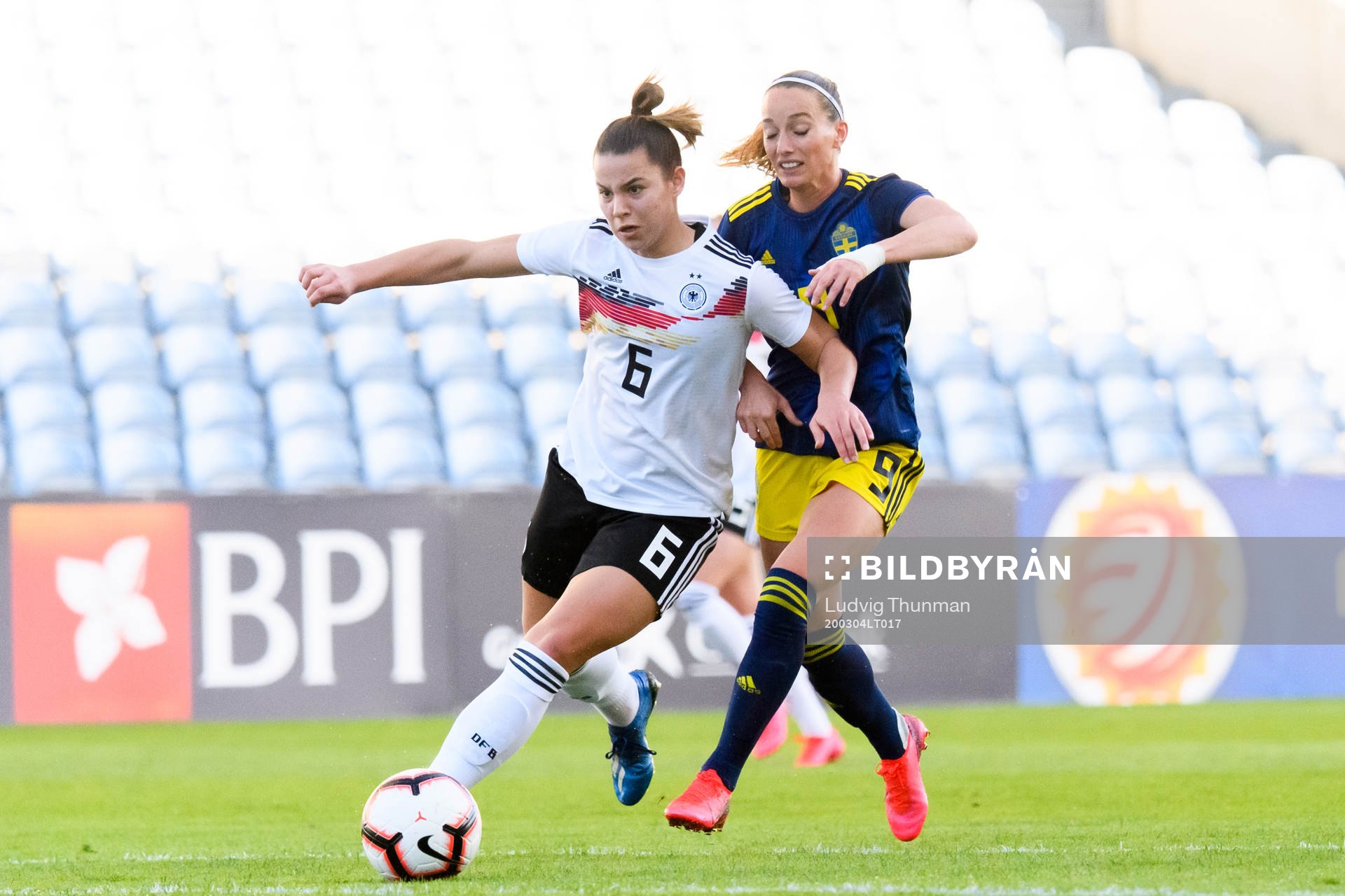 Lena Sophie Oberdorf of Germany and Kosovare Asllani of