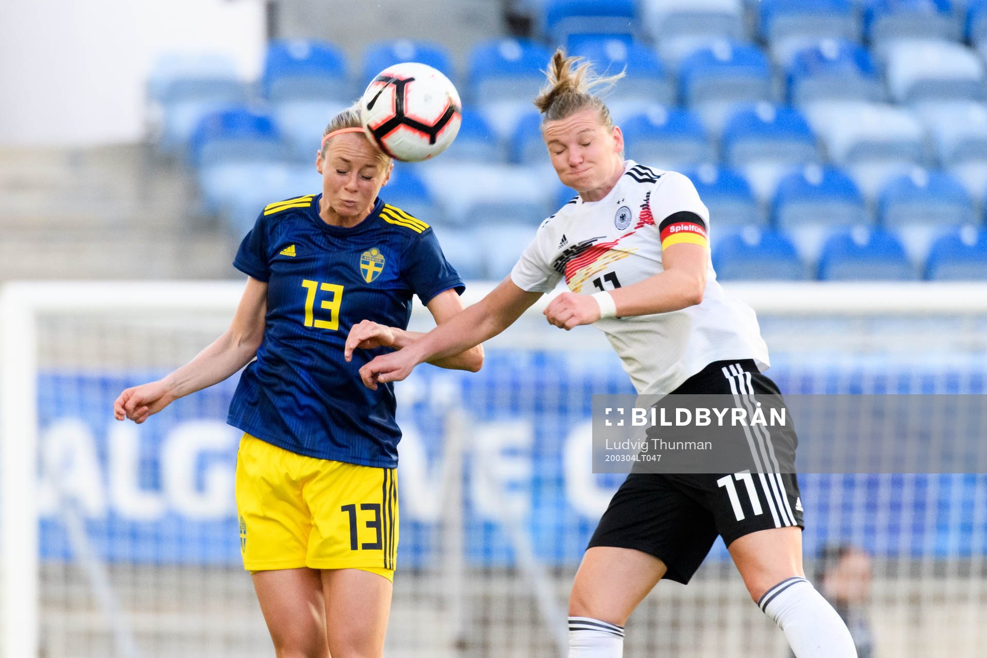 Amanda Ilestedt of Sweden and Alexandra Popp of Germany